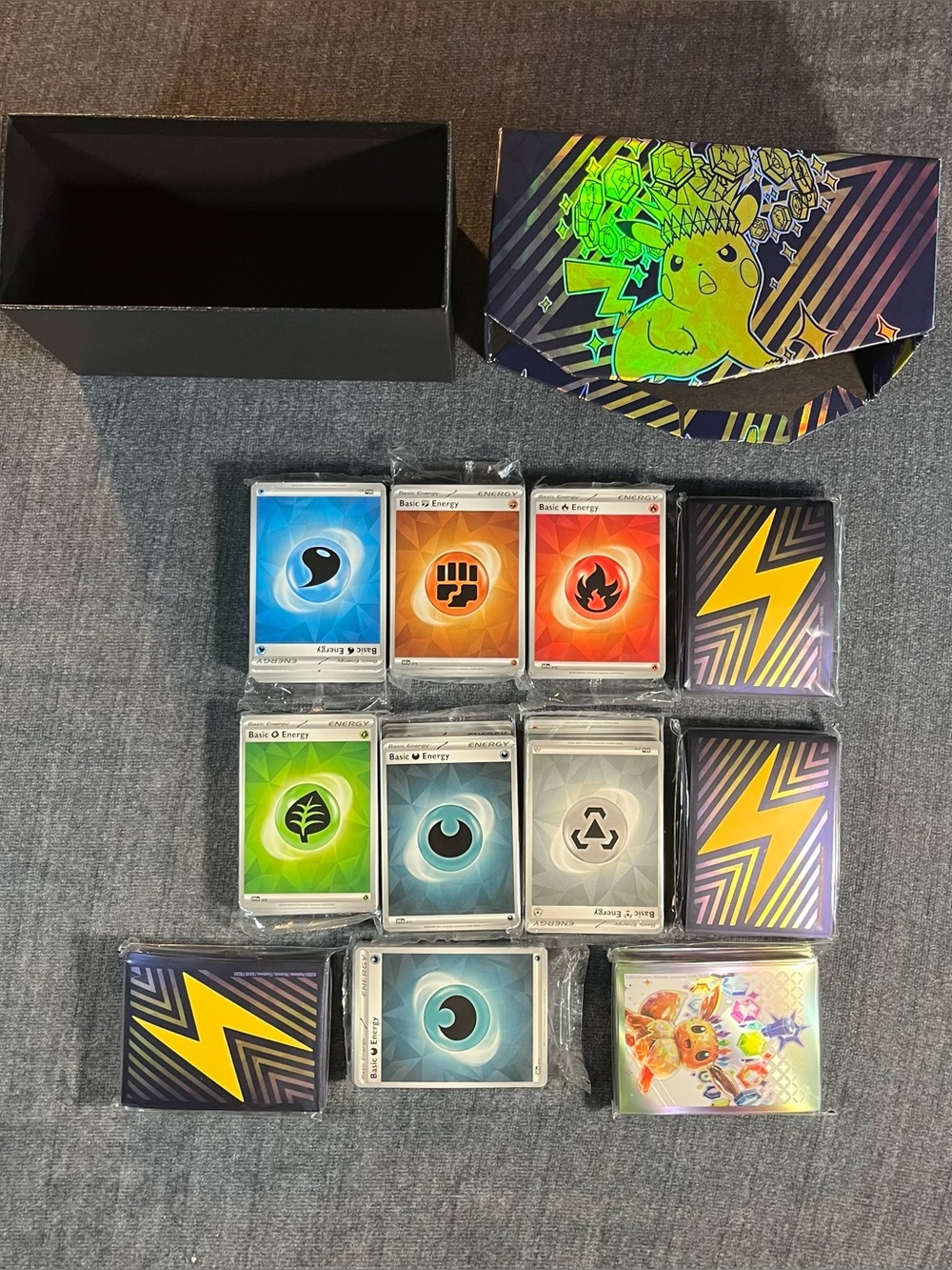 Pokemon Energy Cards Lot Of 7 packs and 4 card sleeves packs factory sealed